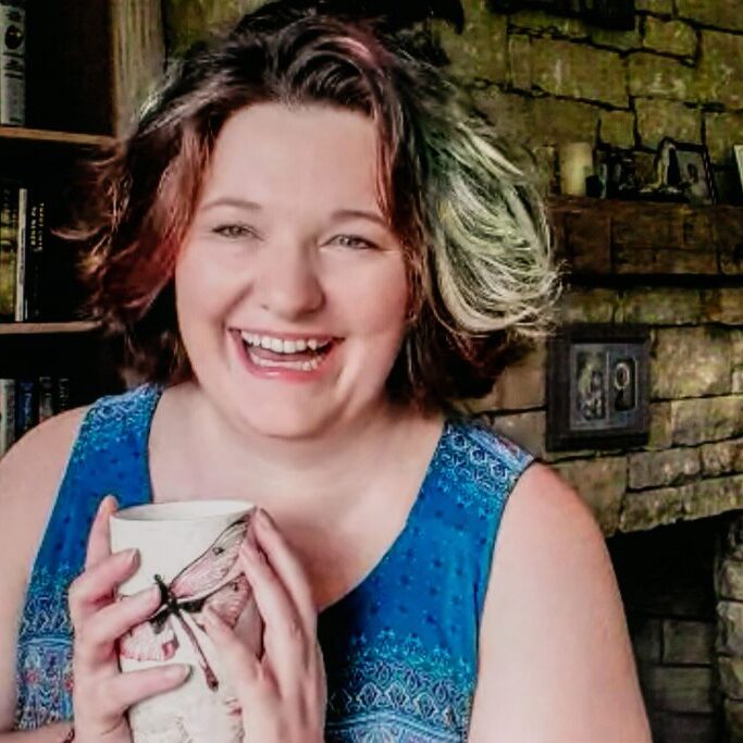 Smiling person holding a mug in cozy rustic living room